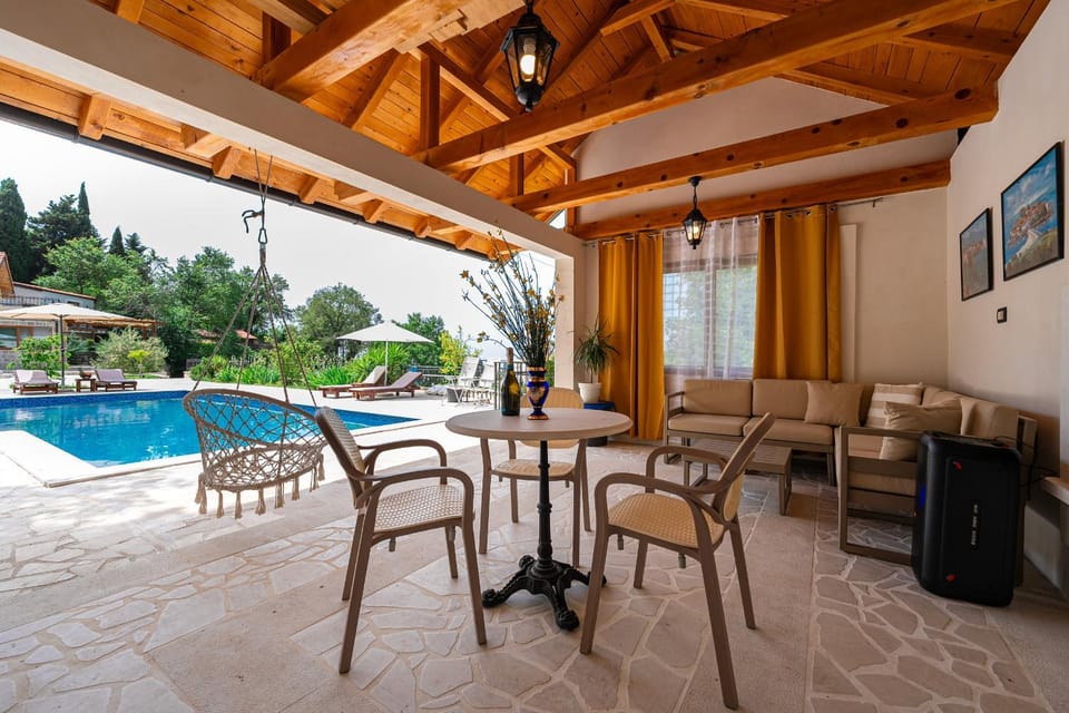 Patio, Day, Living room, Seating area, Dining area, Pool view, Swimming pool, sunbed