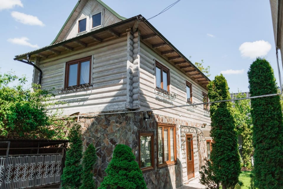 Property building, Facade/entrance, Day, Garden view
