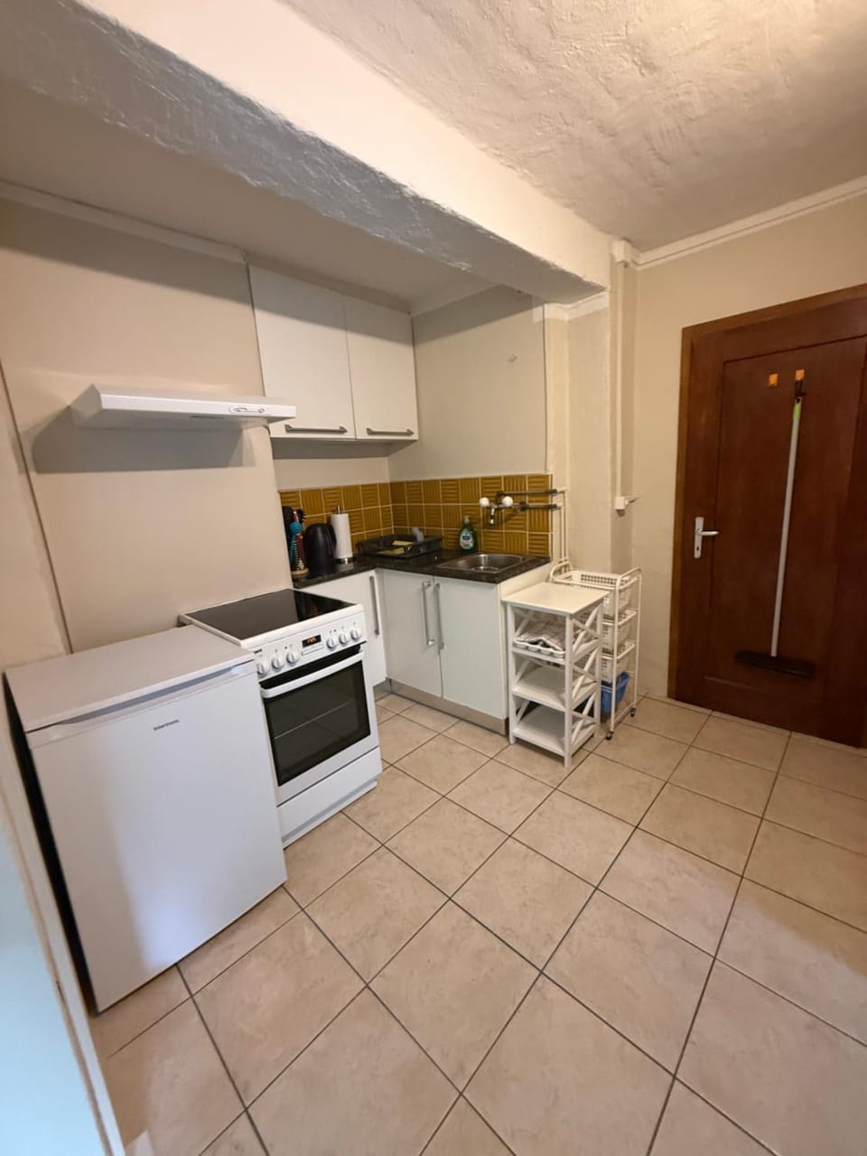 Kitchen or kitchenette, oven