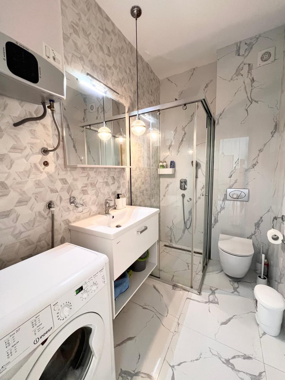 Shower, Toilet, Bathroom, towels, washing machine, dryer