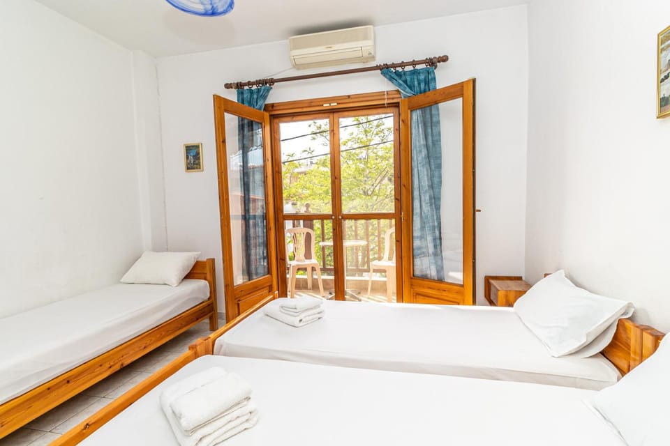 Bed, Photo of the whole room, Bedroom, towels, air conditioner