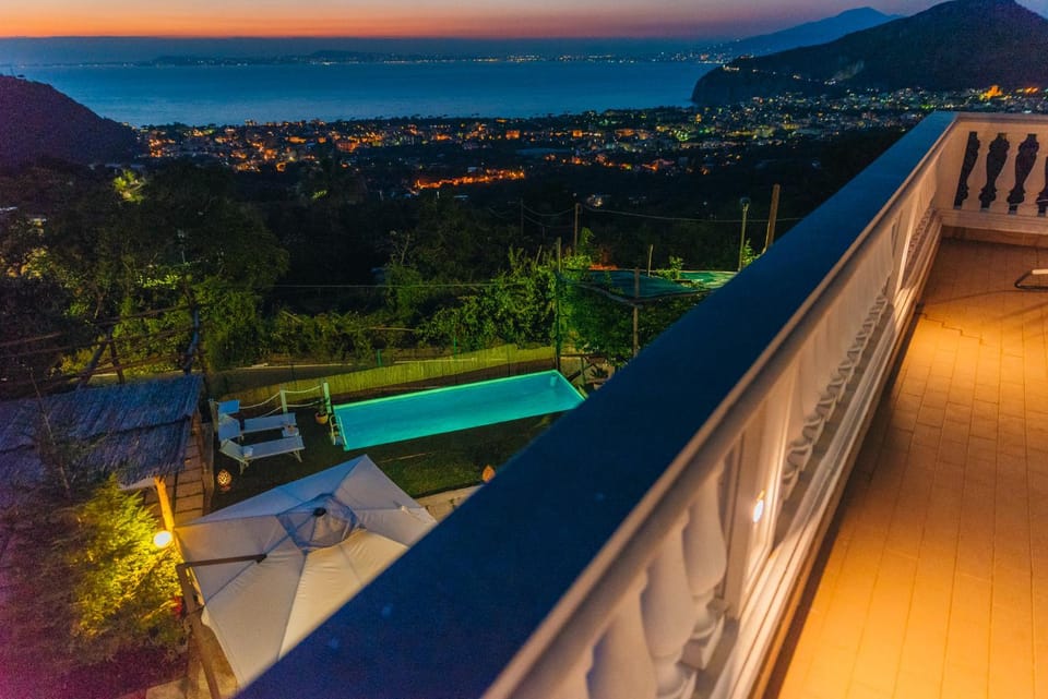 Night, View (from property/room), Balcony/Terrace, Pool view, Sea view, Swimming pool