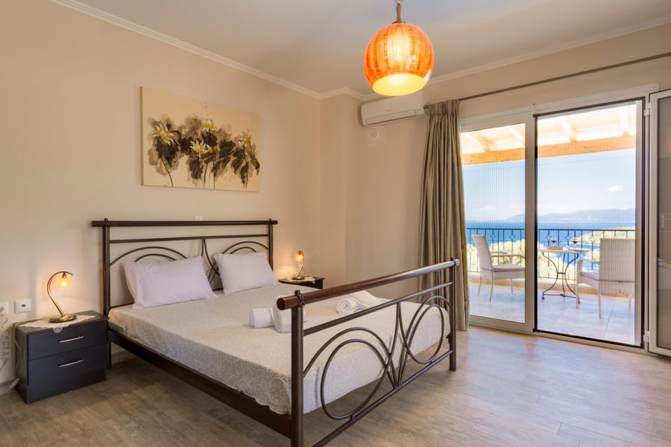 Bed, Bedroom, Garden view, Landmark view, Sea view