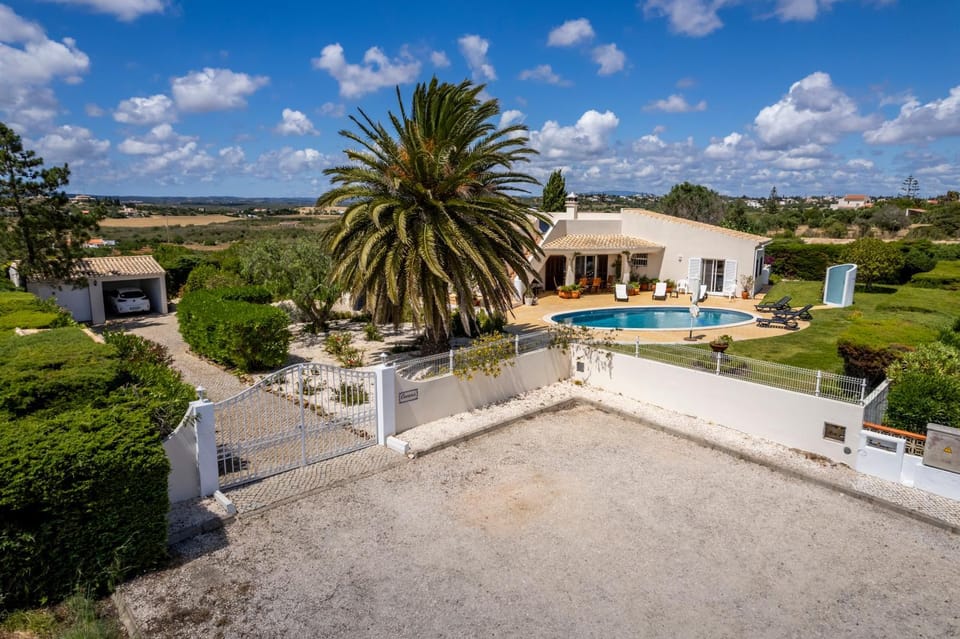 Property building, Day, Natural landscape, Garden, Swimming pool