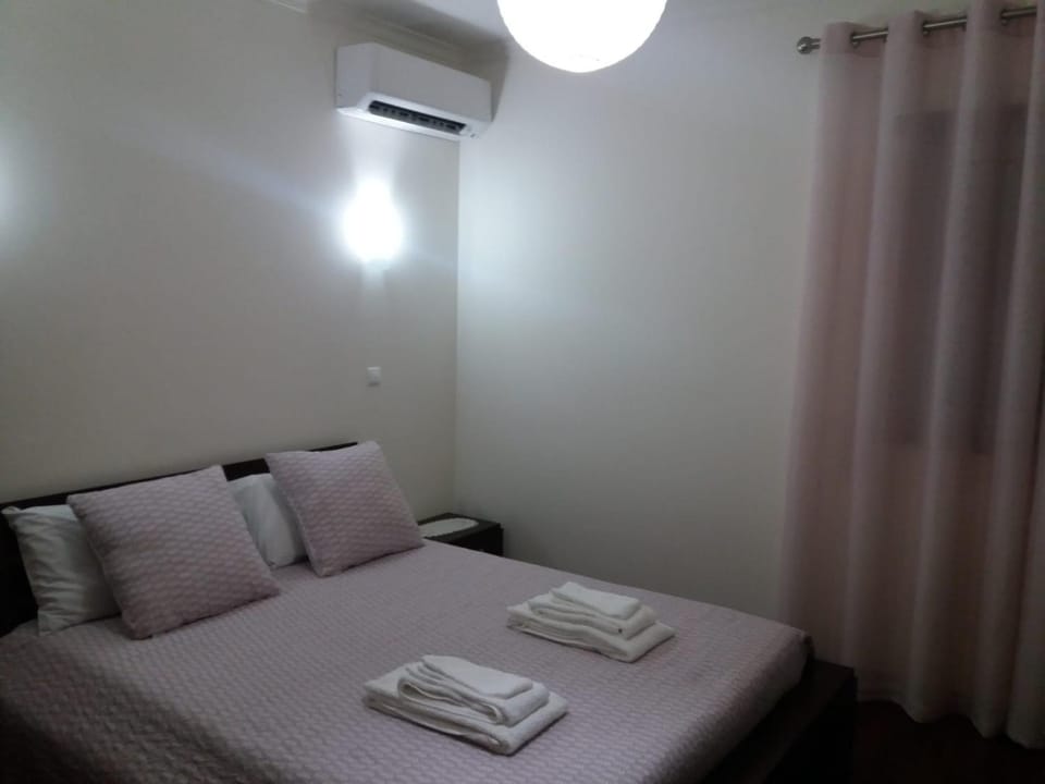 Bed, Photo of the whole room, Bedroom, towels, air conditioner