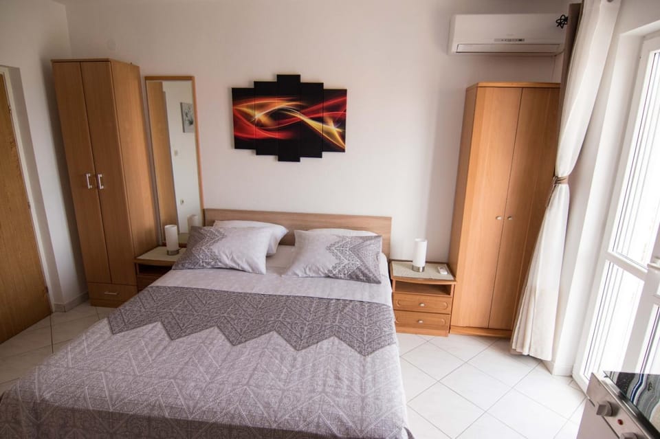 Bed, wardrobe, air conditioner
