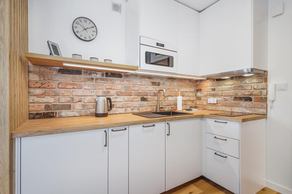 Coffee/tea facilities, dishwasher, furniture, microwave, stove, kitchen