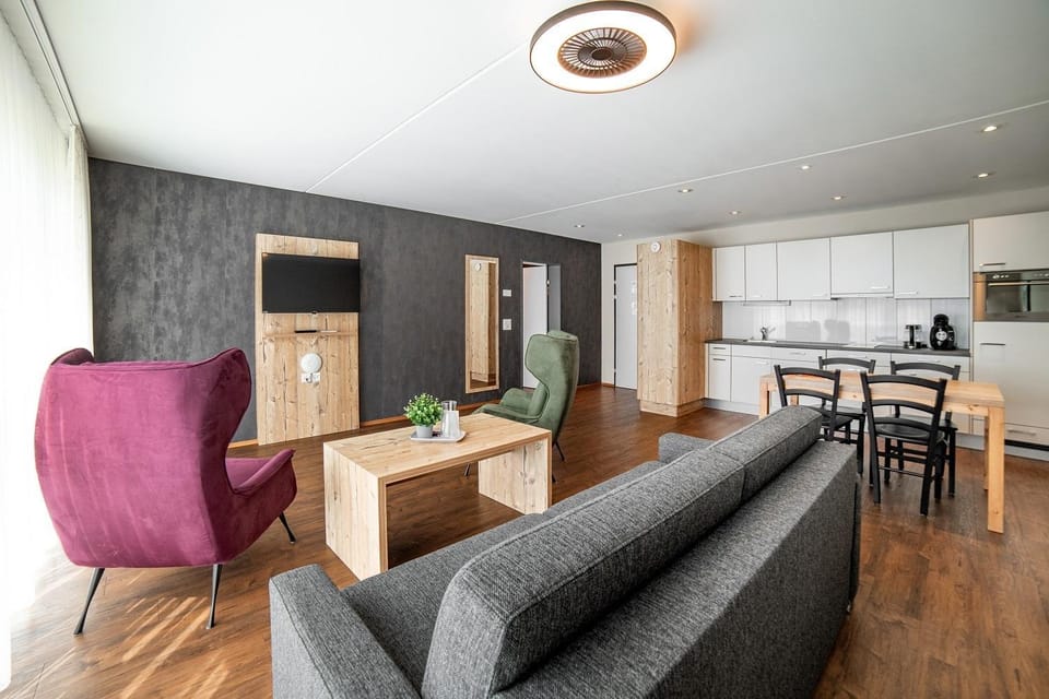 Kitchen or kitchenette, Living room, Seating area, Dining area