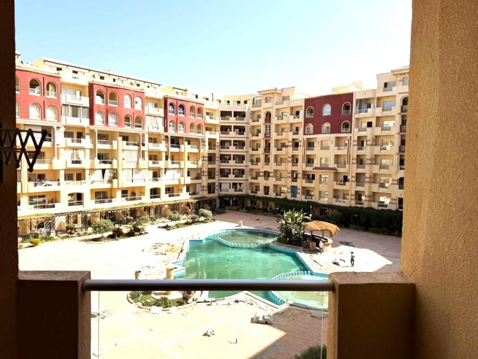 Property building, Day, View (from property/room), Pool view, Swimming pool, sunbed