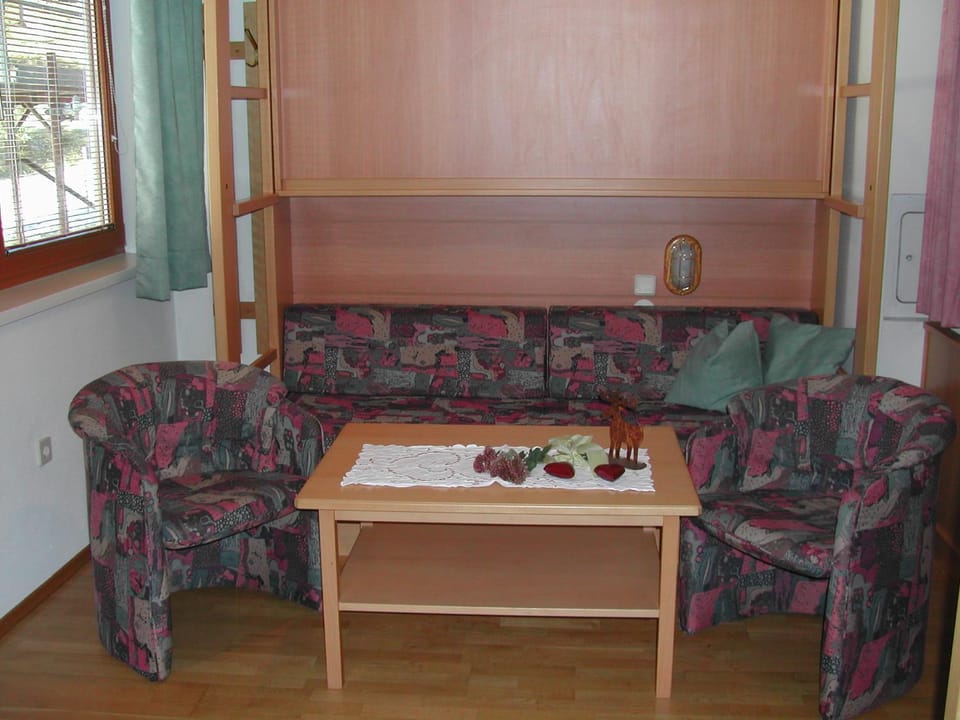 Bed, Living room, Seating area