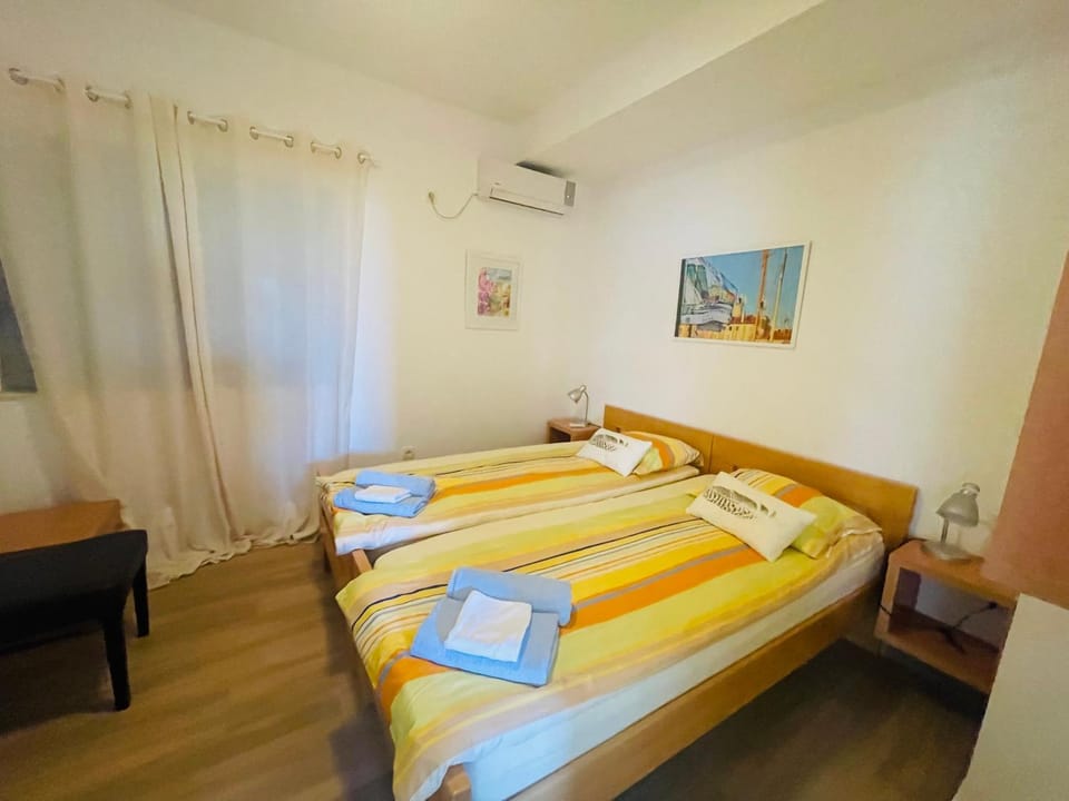Bed, Photo of the whole room, Bedroom, towels, air conditioner