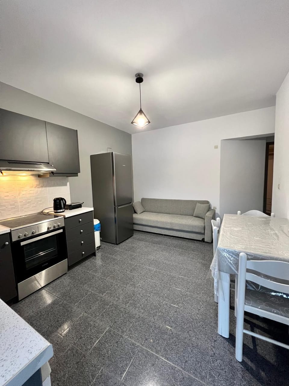 Kitchen or kitchenette, Living room, Seating area, Dining area