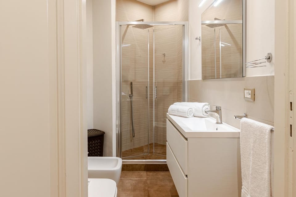 Shower, Toilet, Bathroom, bidet, hair dryier, towels