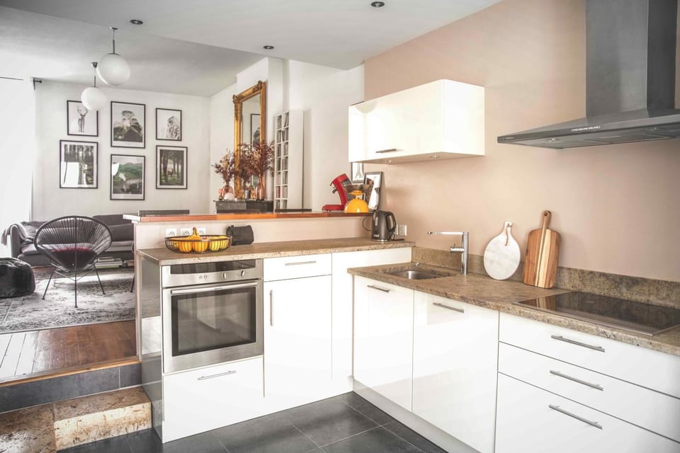 Kitchen or kitchenette, dishwasher, oven, stove