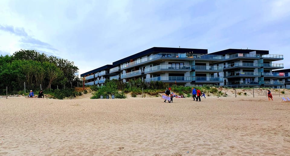 Property building, People, Neighbourhood, Natural landscape, Floor plan, Beach