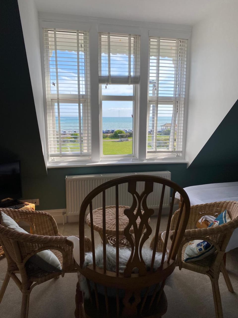 Natural landscape, View (from property/room), Living room, Seating area, Sea view