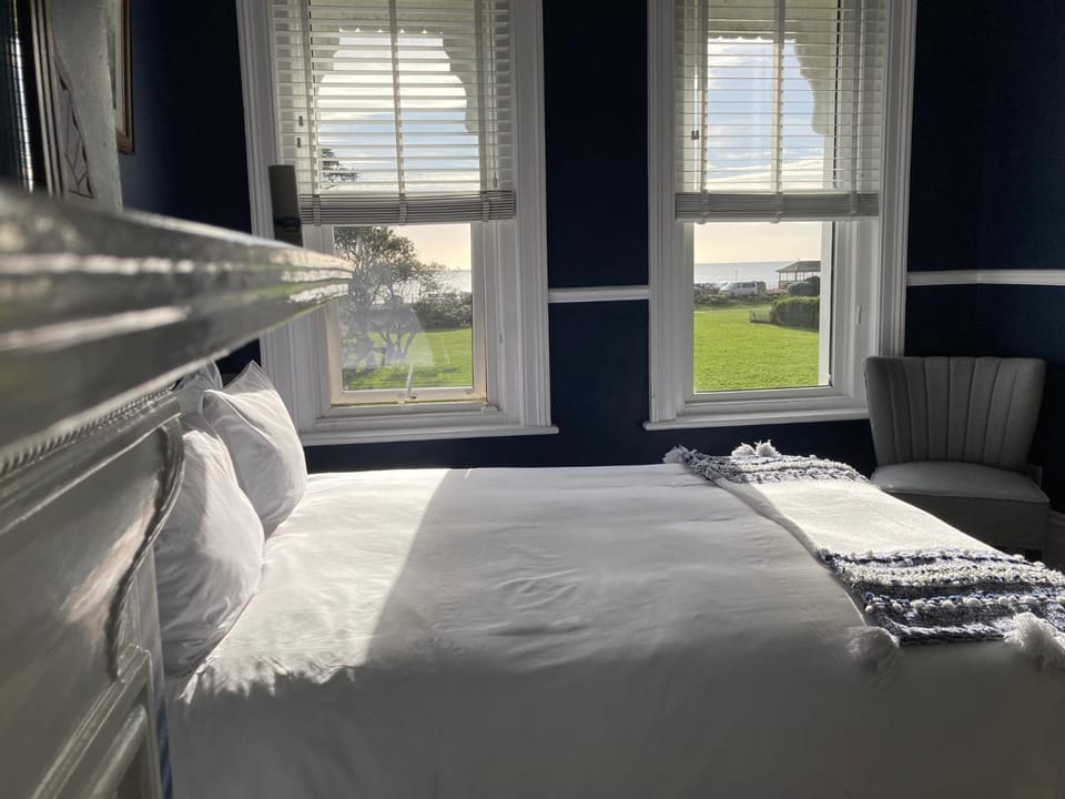 Bed, Seating area, Bedroom, Sea view
