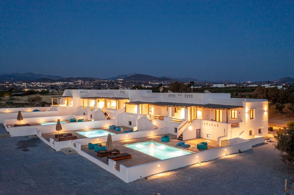Property building, Patio, Nearby landmark, Spring, Day, Night, People, People, People, Natural landscape, Summer, View (from property/room), Other, Other, Other, Seating area, Autumn, Text overlay, Text overlay, Text overlay, Guests, Garden view, Landmark view, Mountain view, Pool view, Sea view, Sea view, Area and facilities, Area and facilities, Area and facilities, Swimming pool, Seasons, Time of day, Sunrise, Sunset, children, young children, older children, group of guests, Family, concierge, internet, safe, soundproof, sunbed, towels, VIP, wedding, air conditioner