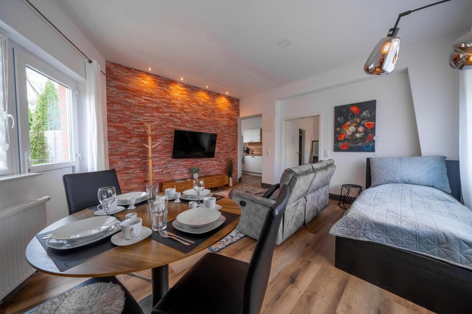 Bed, TV and multimedia, Living room, Seating area, Dining area