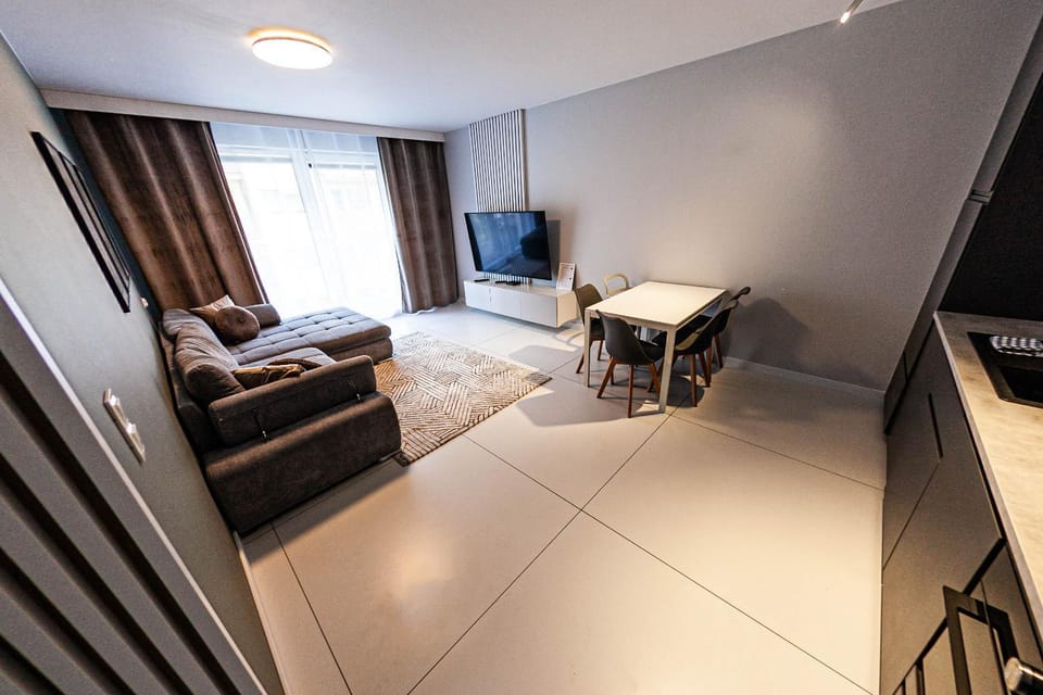 Kitchen or kitchenette, Living room, Seating area, Dining area