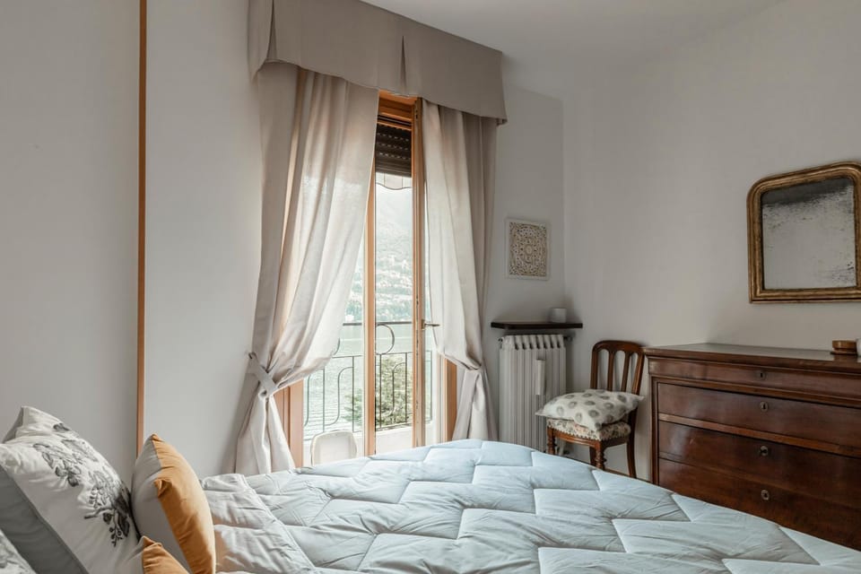 Bed, Photo of the whole room, Bedroom, Lake view, hair dryier, towels, wardrobe, air conditioner