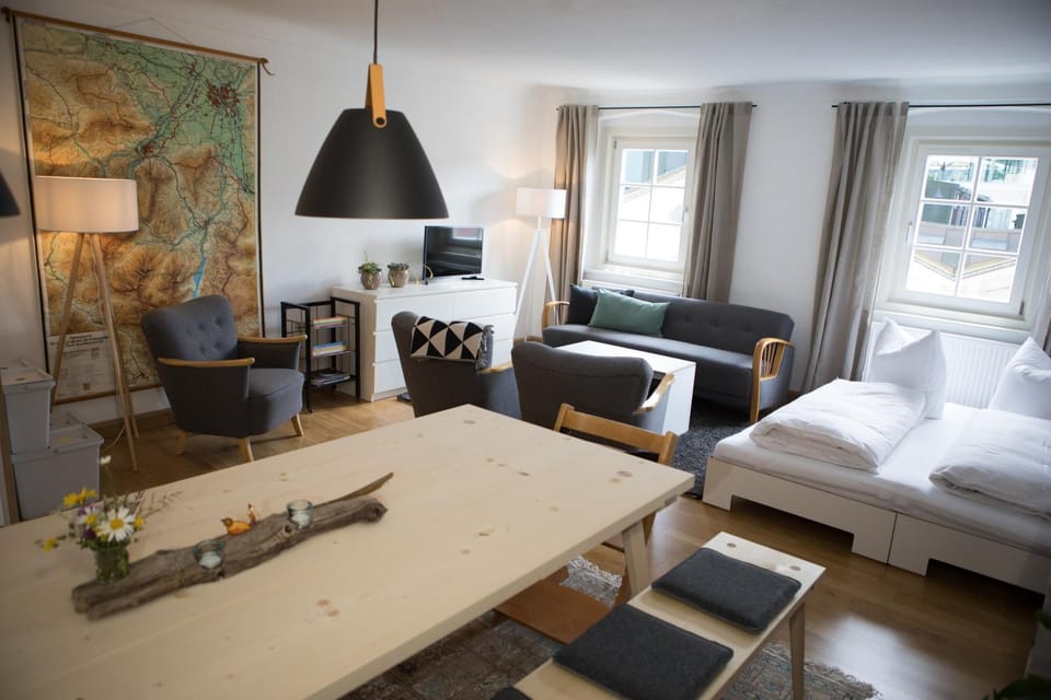 Bed, Living room, Seating area, Dining area