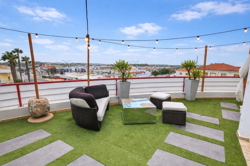 Penthouse with Private Rooftop & Seaview Apartment in Guia
