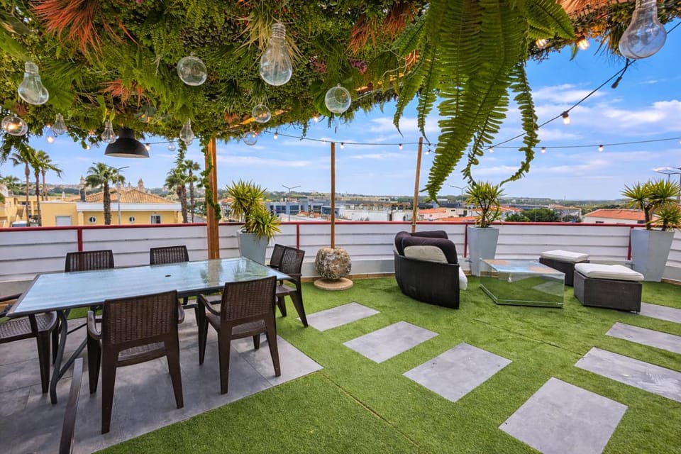Penthouse with Private Rooftop & Seaview Apartment in Guia