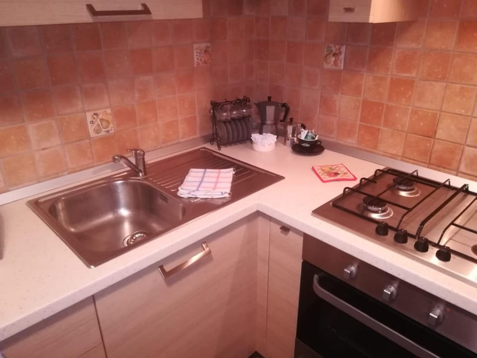 Kitchen or kitchenette, stove