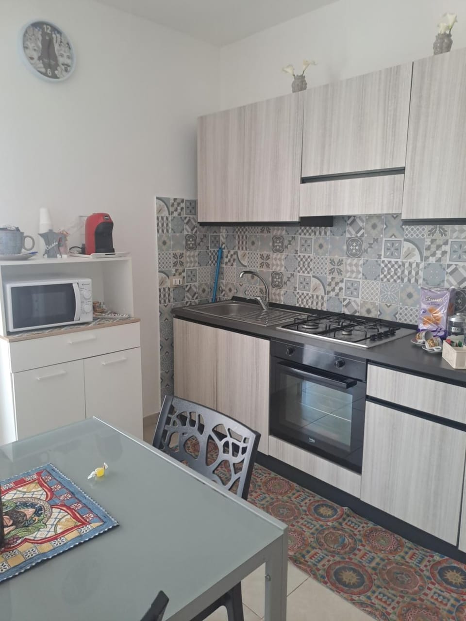 Kitchen or kitchenette, oven, stove