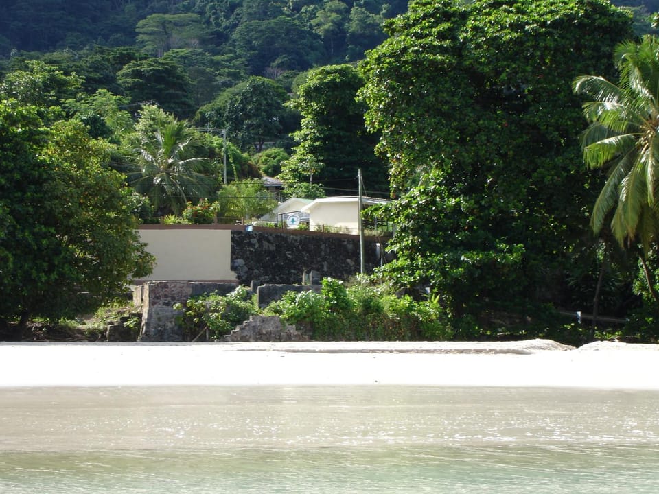 Property building, Facade/entrance, Neighbourhood, Natural landscape, Beach, Beach, Hiking, Diving, Mountain view, Sea view, Location
