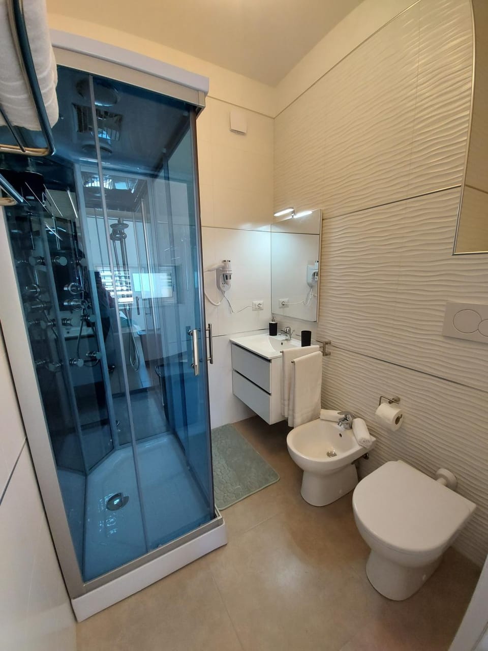 Shower, Toilet, Bathroom, bidet, hair dryier, towels