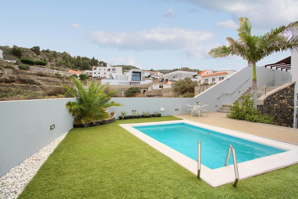 Property building, Living room, Swimming pool