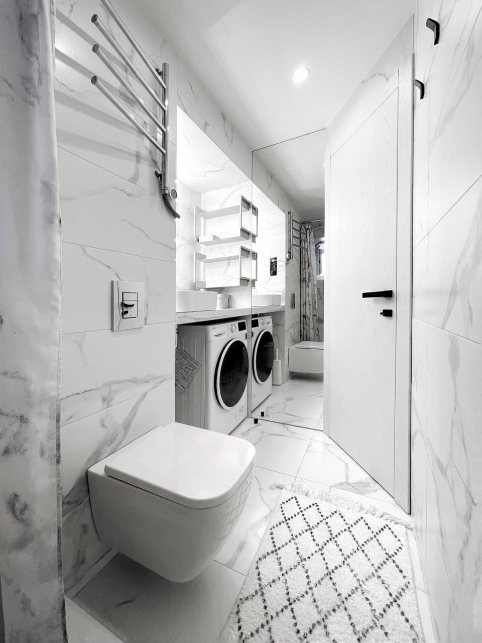 Shower, towels, washing machine, dryer