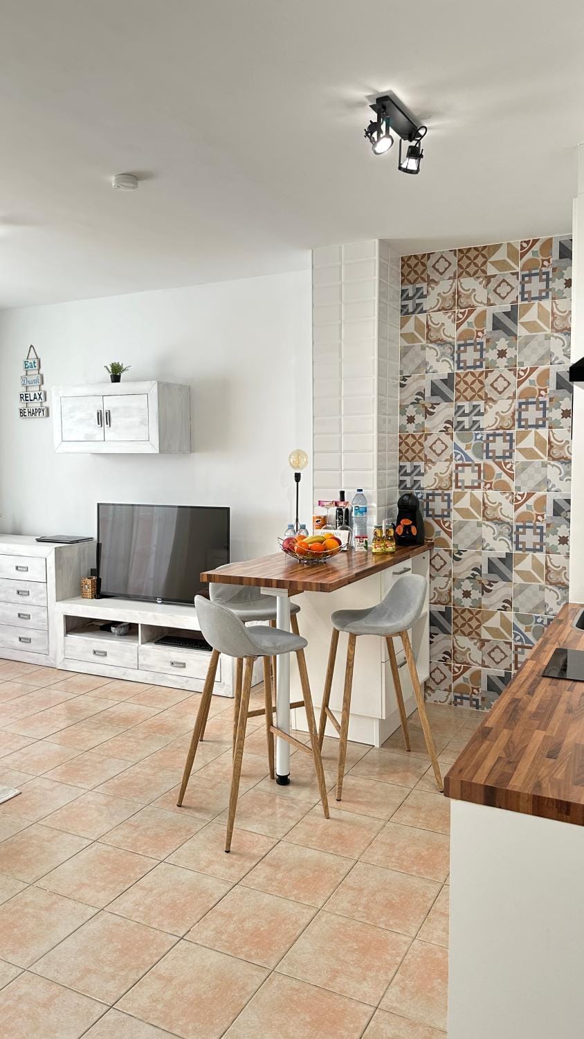 Kitchen or kitchenette, Living room, Seating area, Dining area