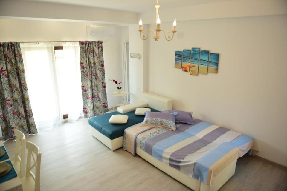 Bed, Living room, Seating area