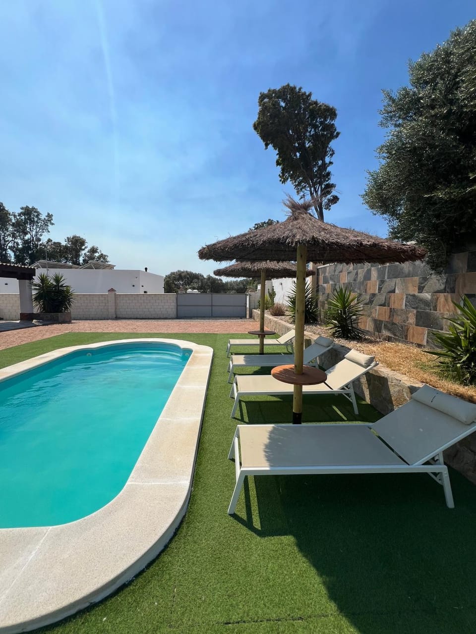 Patio, Off site, Pool view, Swimming pool, sunbed