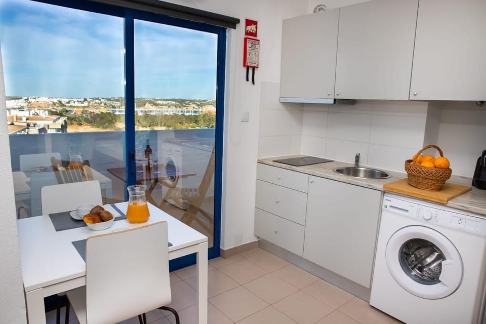 View (from property/room), Dining area, stove, washing machine, dryer
