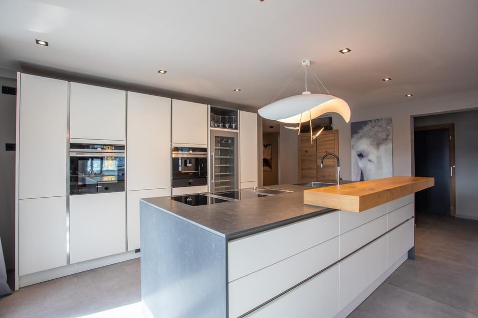 Kitchen or kitchenette, dishwasher, oven, stove