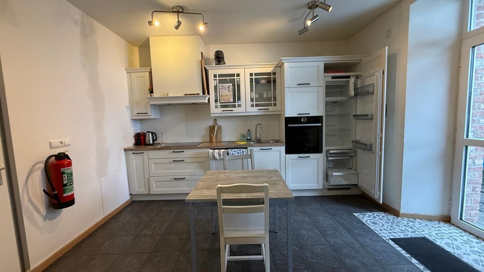 Dining area, dishwasher, oven, stove