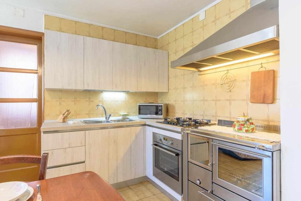 Kitchen or kitchenette, oven, stove