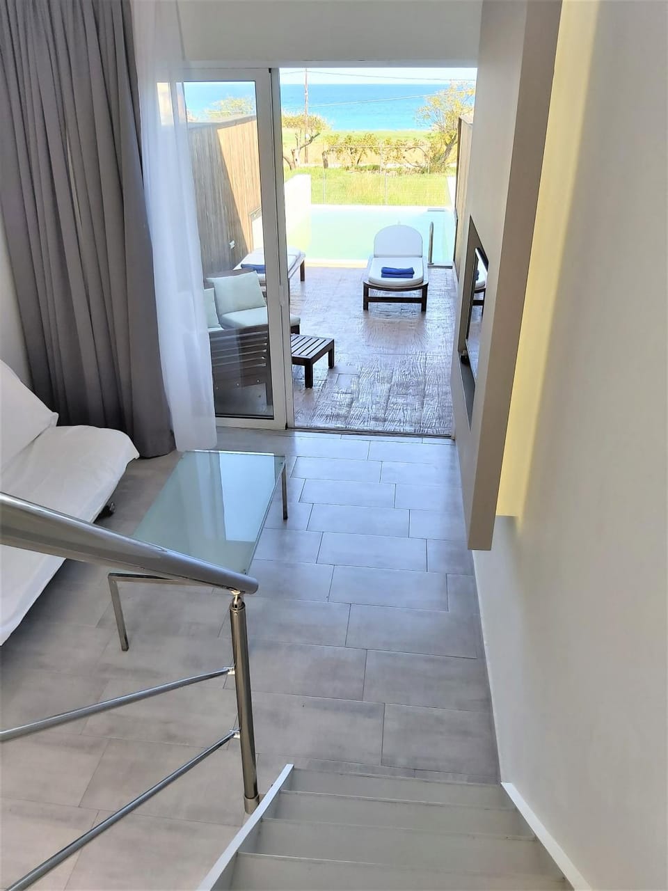 Balcony/Terrace, Living room, Seating area, Swimming pool