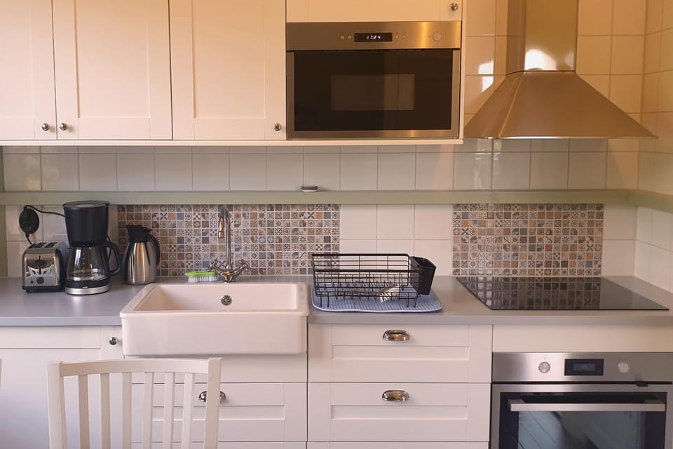Kitchen or kitchenette, stove, toaster