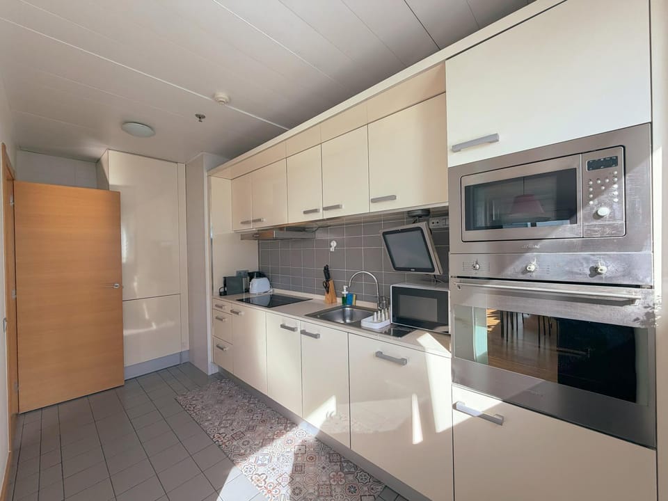 Kitchen or kitchenette, oven, stove, toaster, kitchen
