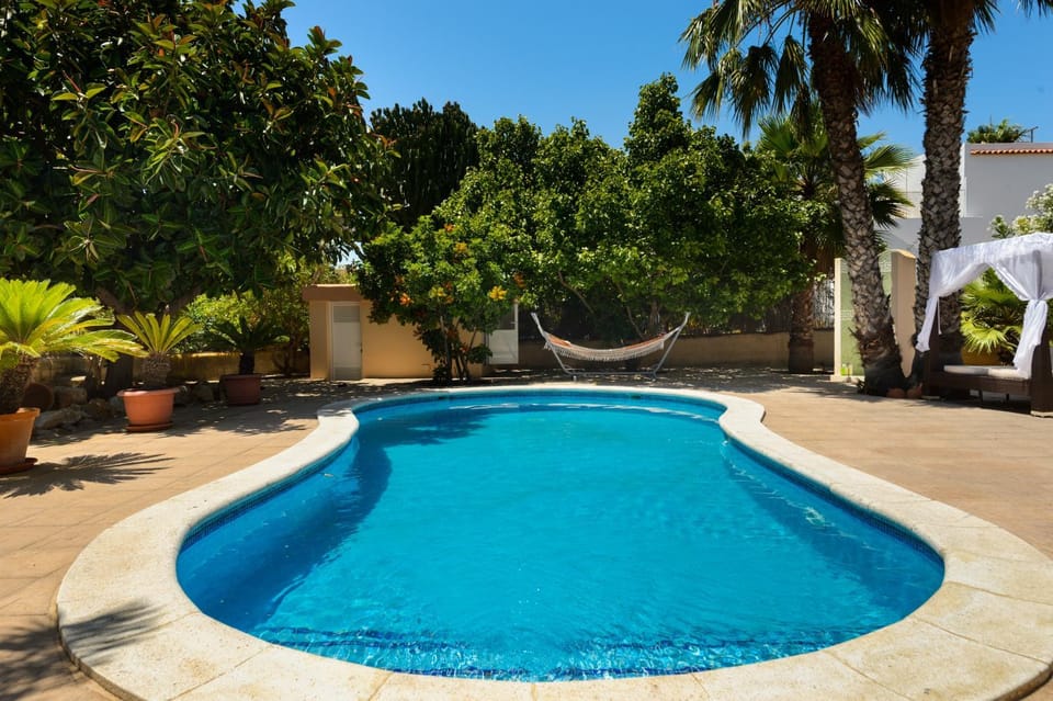 Property building, Living room, Swimming pool