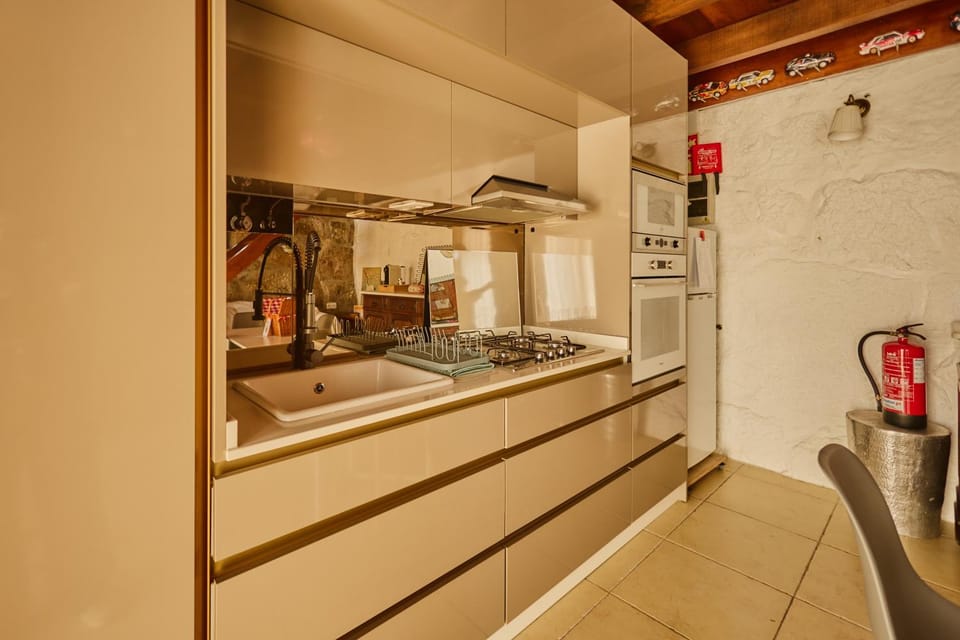 Kitchen or kitchenette, microwave, stove, kitchen