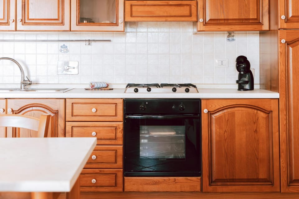 Kitchen or kitchenette, oven, stove