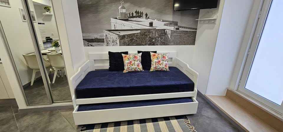 Bed, Living room, Seating area