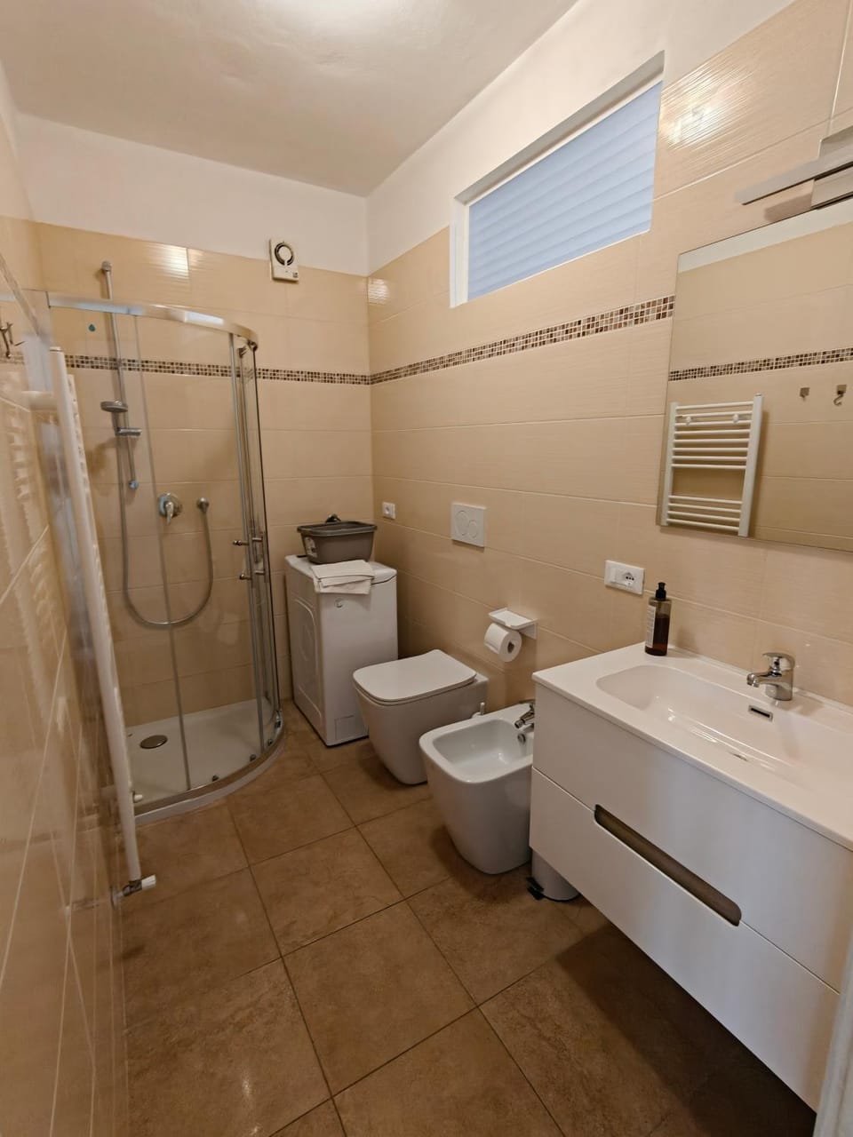 Bathroom, bidet, washing machine