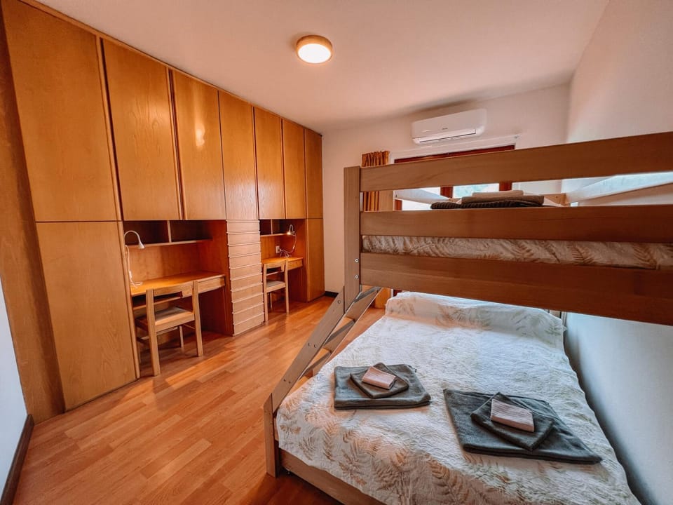 Bed, Photo of the whole room, Bedroom, bunk bed, towels, wardrobe, air conditioner